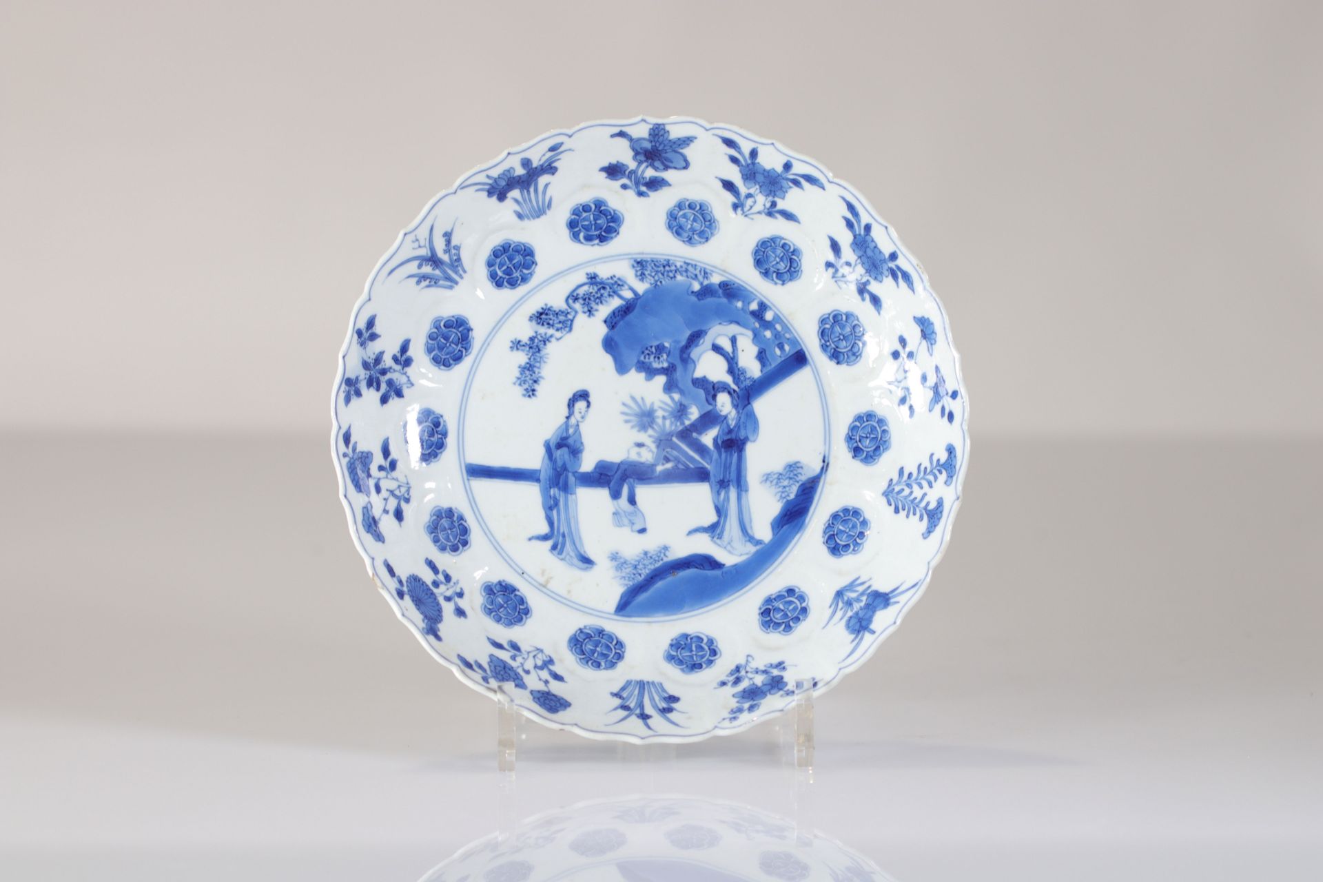 Blanc-bleu plate 18th century garden scene Kangxi mark and period