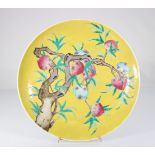 China large dish on a yellow background decorated with peaches- Guangxu mark and period