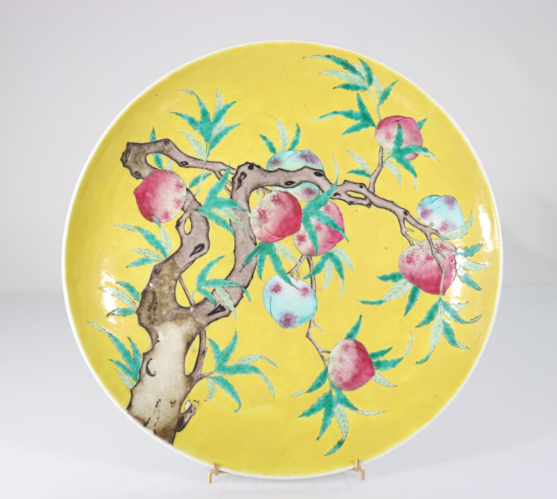 China large dish on a yellow background decorated with peaches- Guangxu mark and period