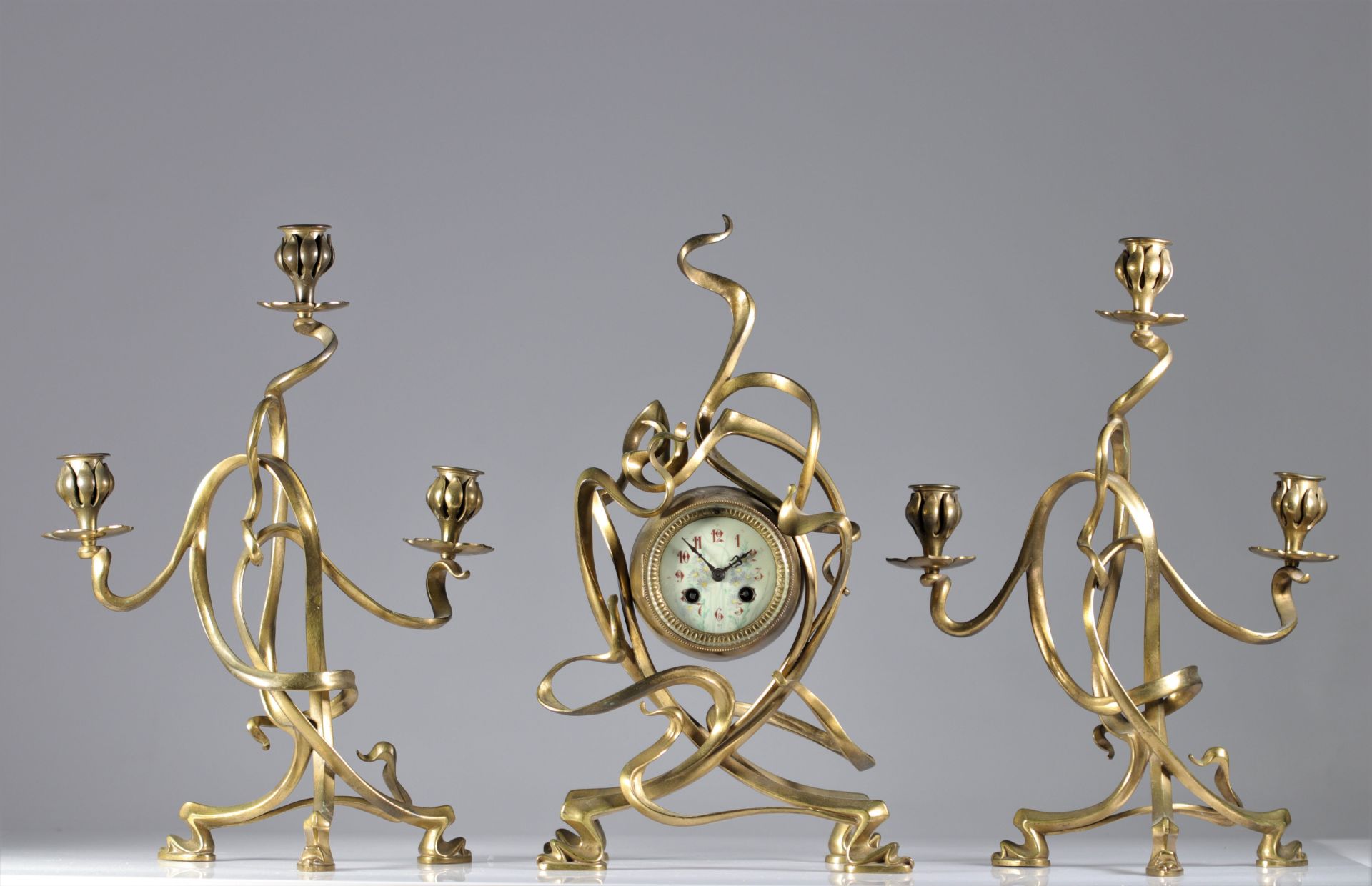 Clock and candelabra Art Nouveau model Horta in bronze 1900