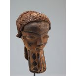 Carved wooden Pende mask