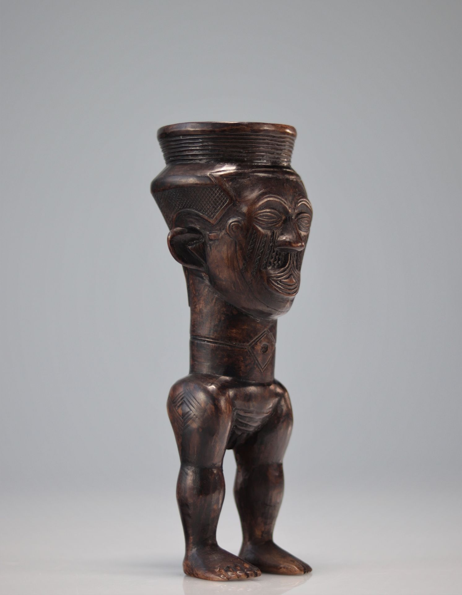 Anthropomorphic carved Kuba palm wine cup with beautiful patina of use