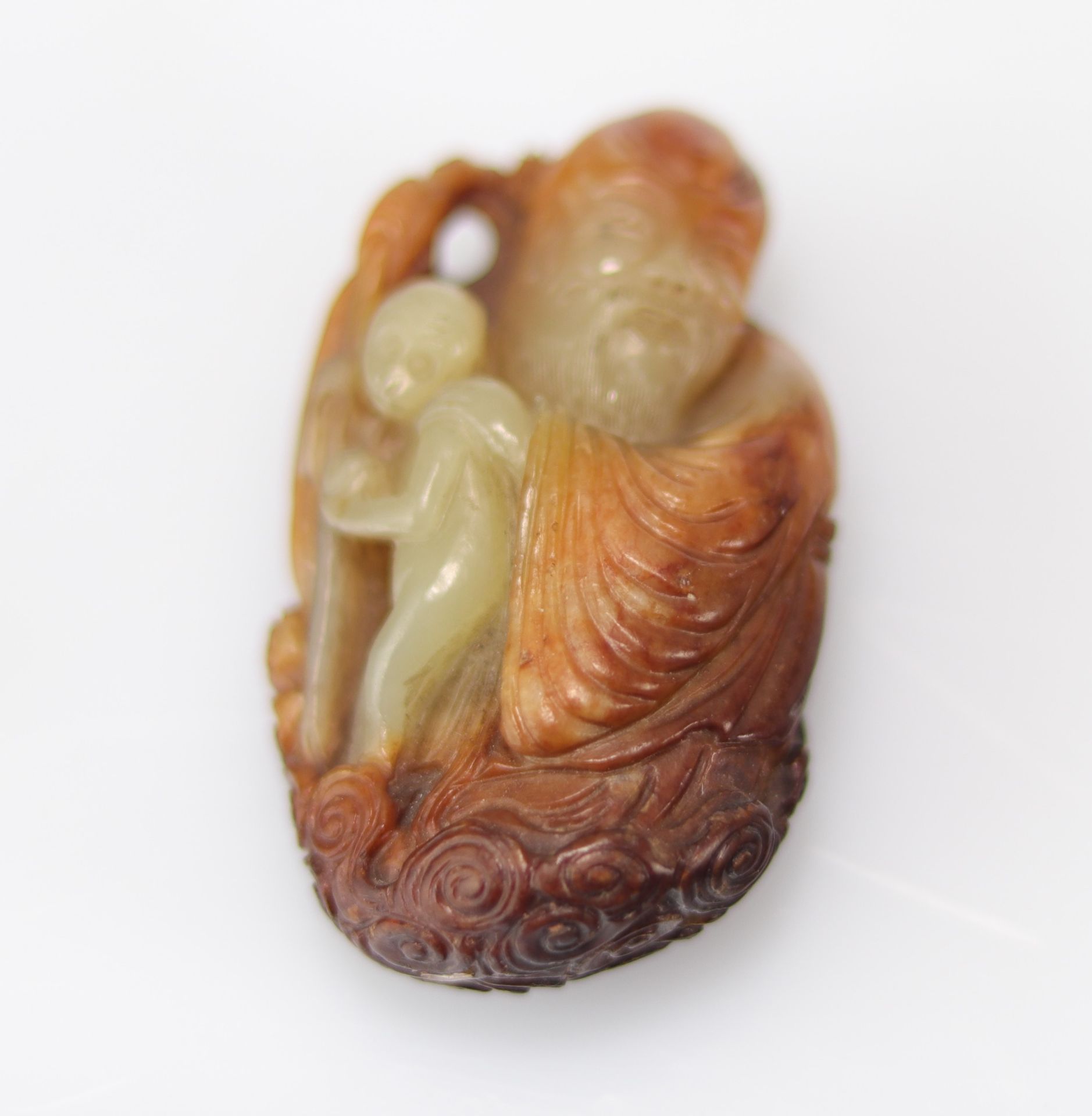 Qing period celadon and rust jade shouloa and monkey - Image 3 of 5