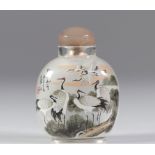 Chinese painted glass snuff bottle decorated with cranes