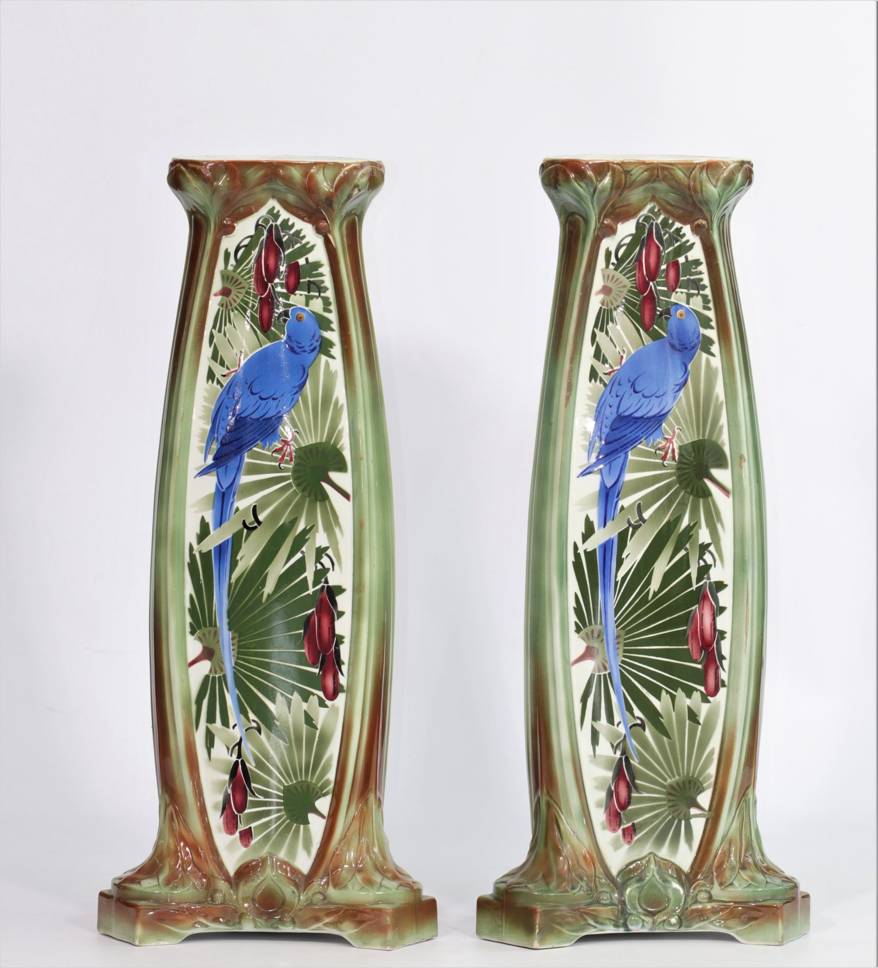Pair of art-deco columns decorated with blue macaws, K G Luneville, signed - circa 1930