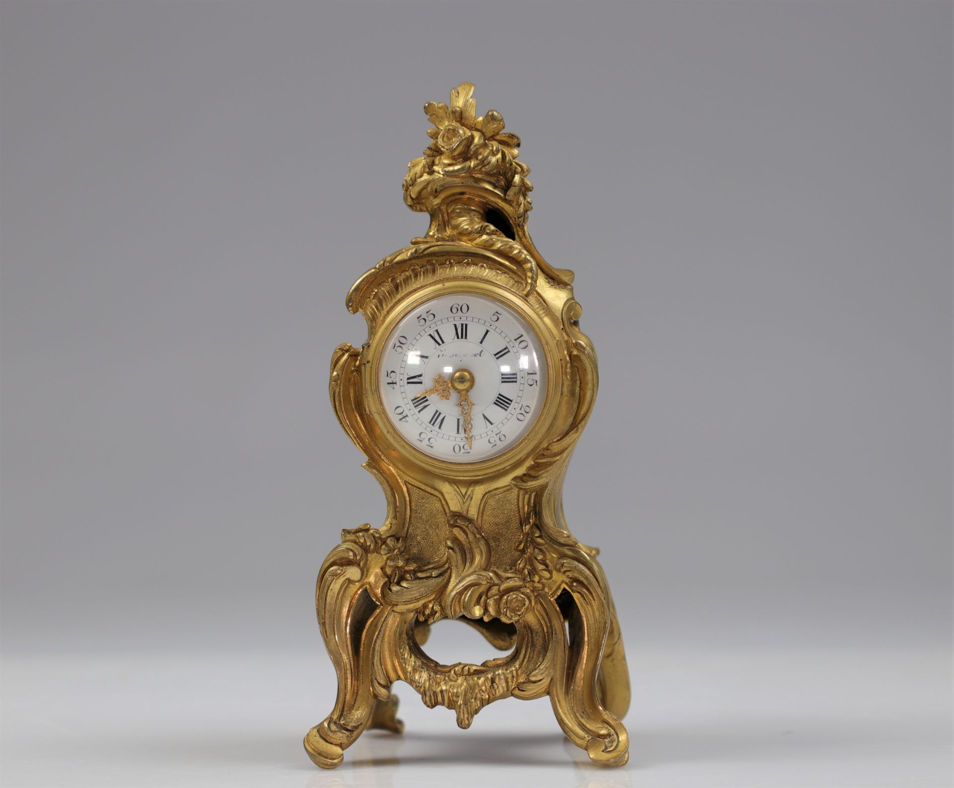 Louis XV clock in gilded bronze