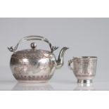China silver teapot and cup