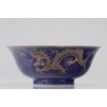 Large blue and gold powdered porcelain bowl decorated with a 19th century dragon