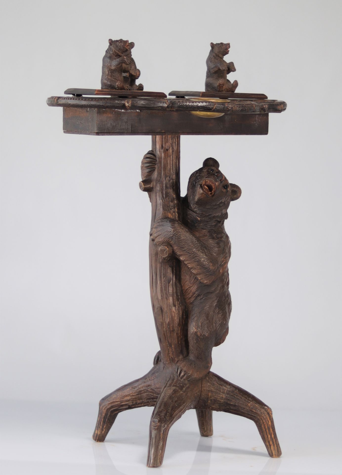 Smoking table in carved wood decorated with bears 19th