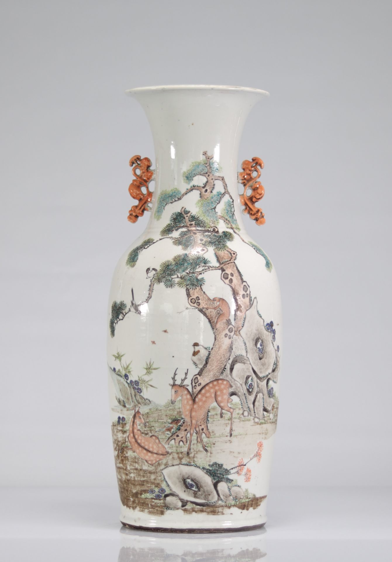 Chinese porcelain vase decorated with suede. Artist vase.