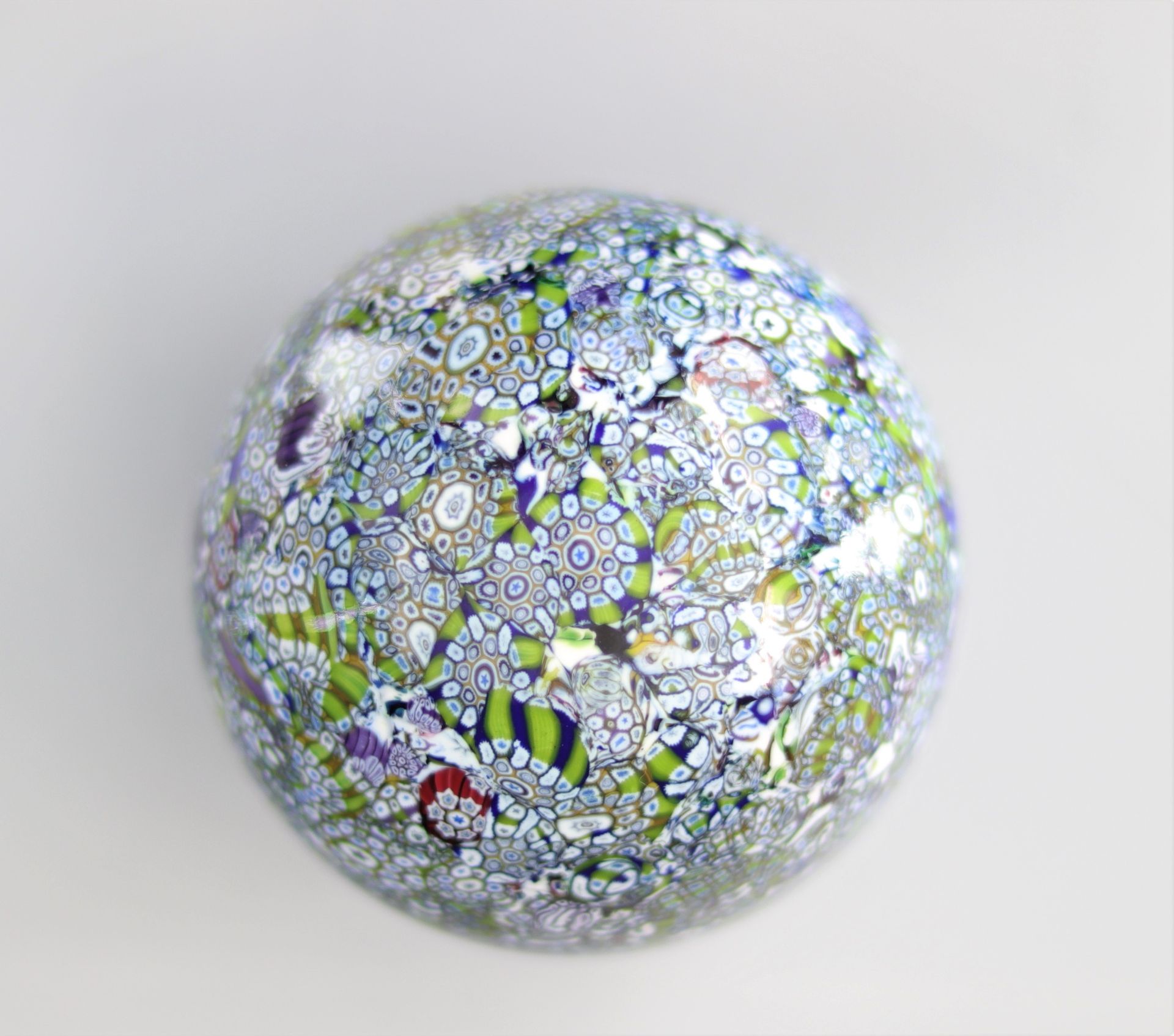 1983 John Deacons paperweight, covered in canes