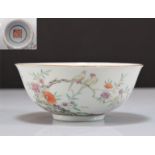 Large famille rose porcelain bowl decorated with birds and flowers