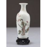 Porcelain vase decorated with a woman circa 1900