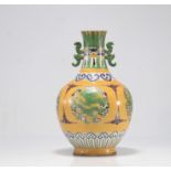 Glazed sandstone vase with yellow background decorated with imperial dragons