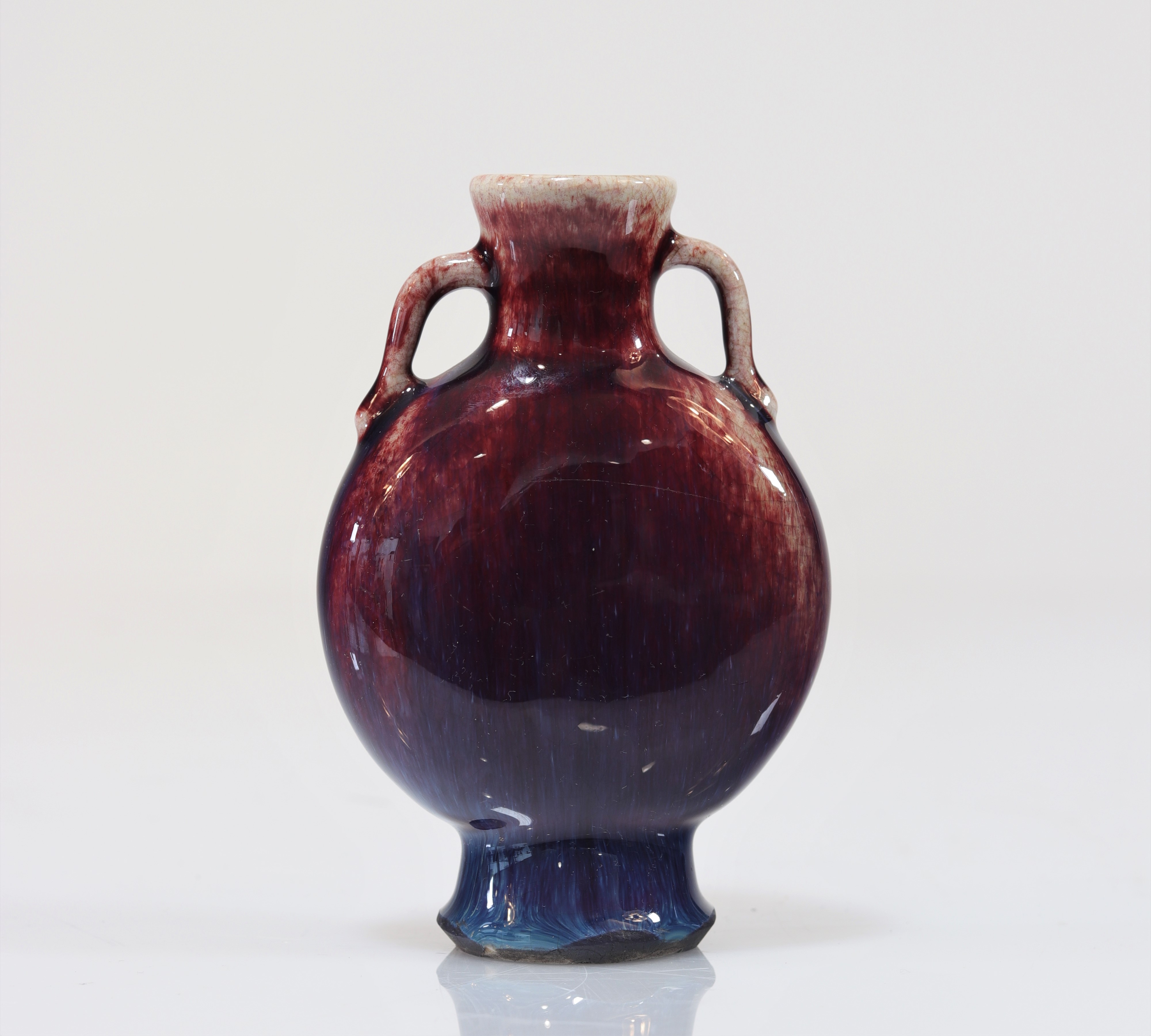 Qing period flamed oxblood gourd vase