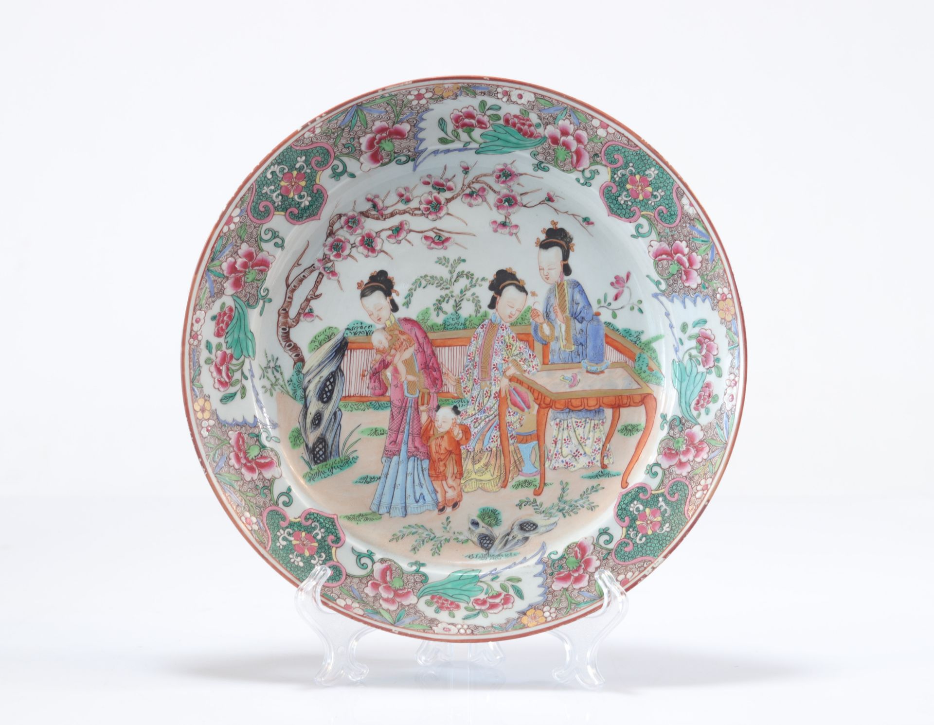 Large famille rose dish decorated with women in the 18th century garden