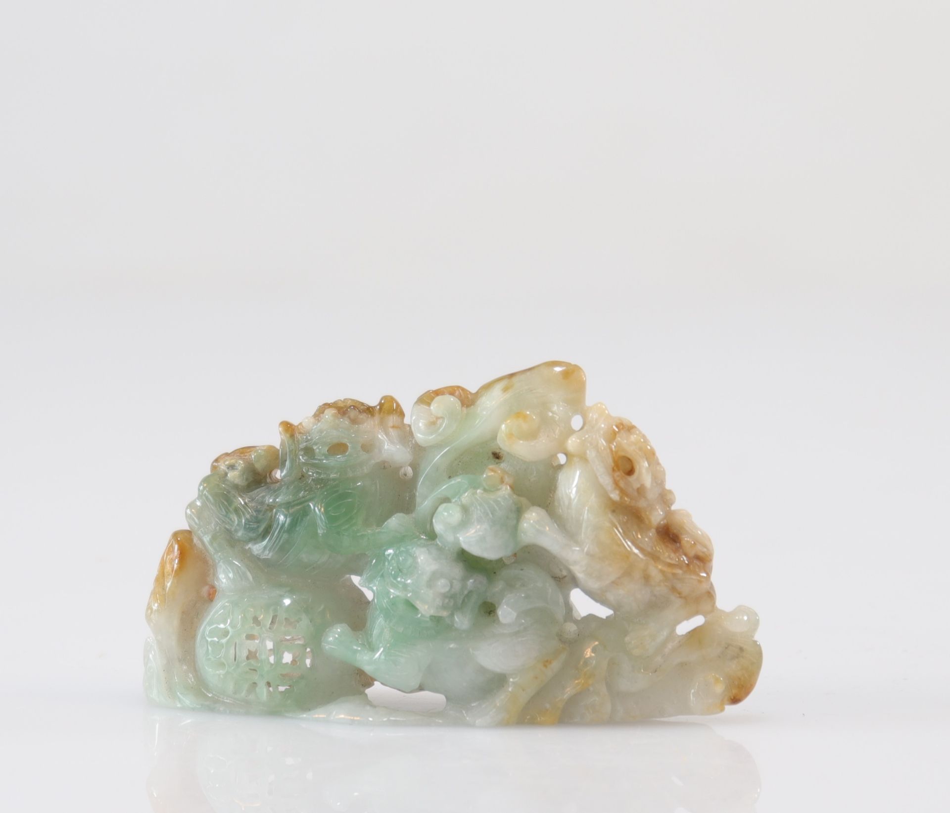 Group in green and rust jade decorated with 3 lions and openwork ball - Image 2 of 2