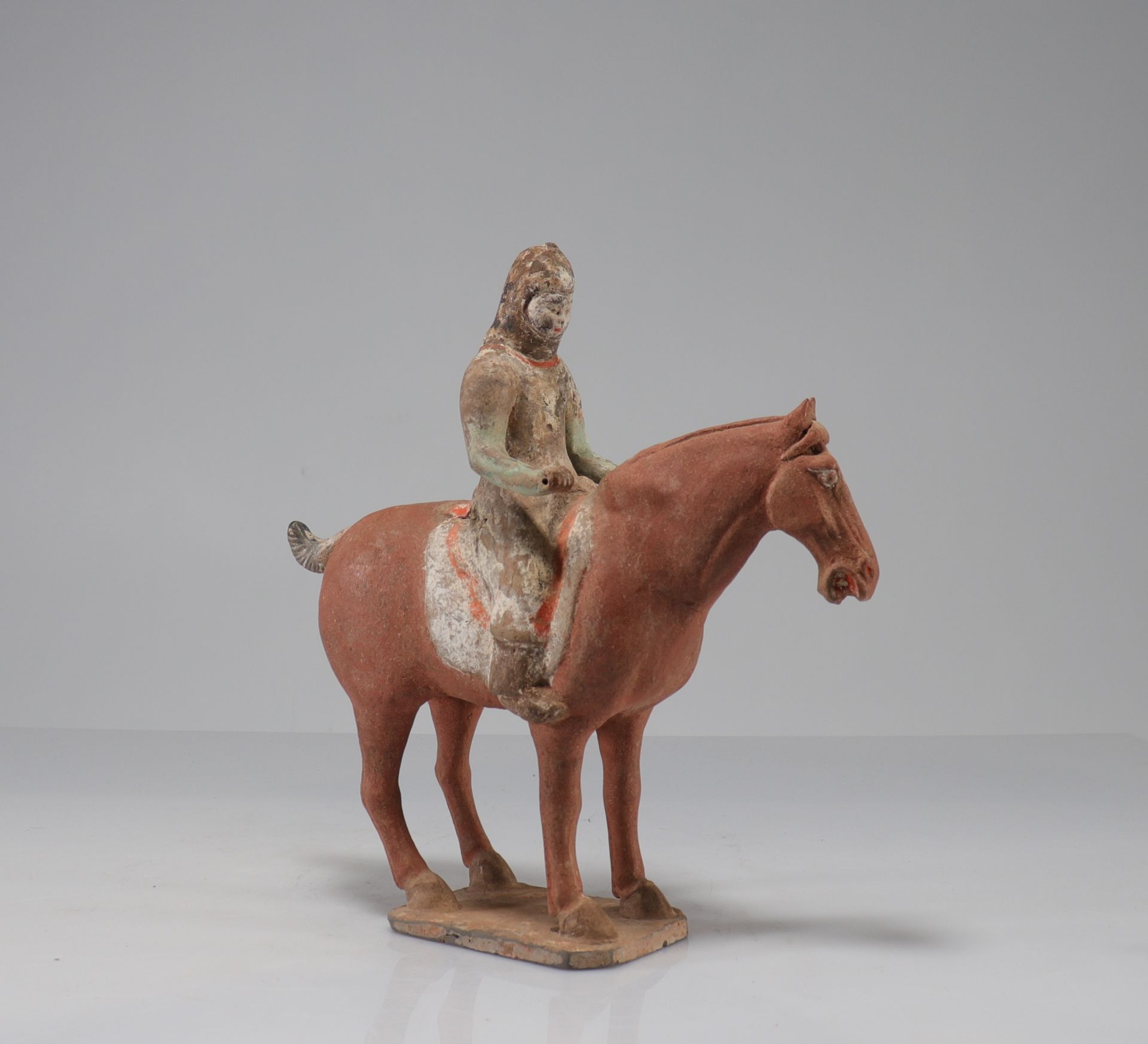 CHINA - TANG period (618-907) Rider on horseback at a standstill Terracotta with traces of white sli - Image 2 of 7