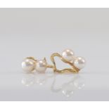 Pair of yellow gold and pearl earrings