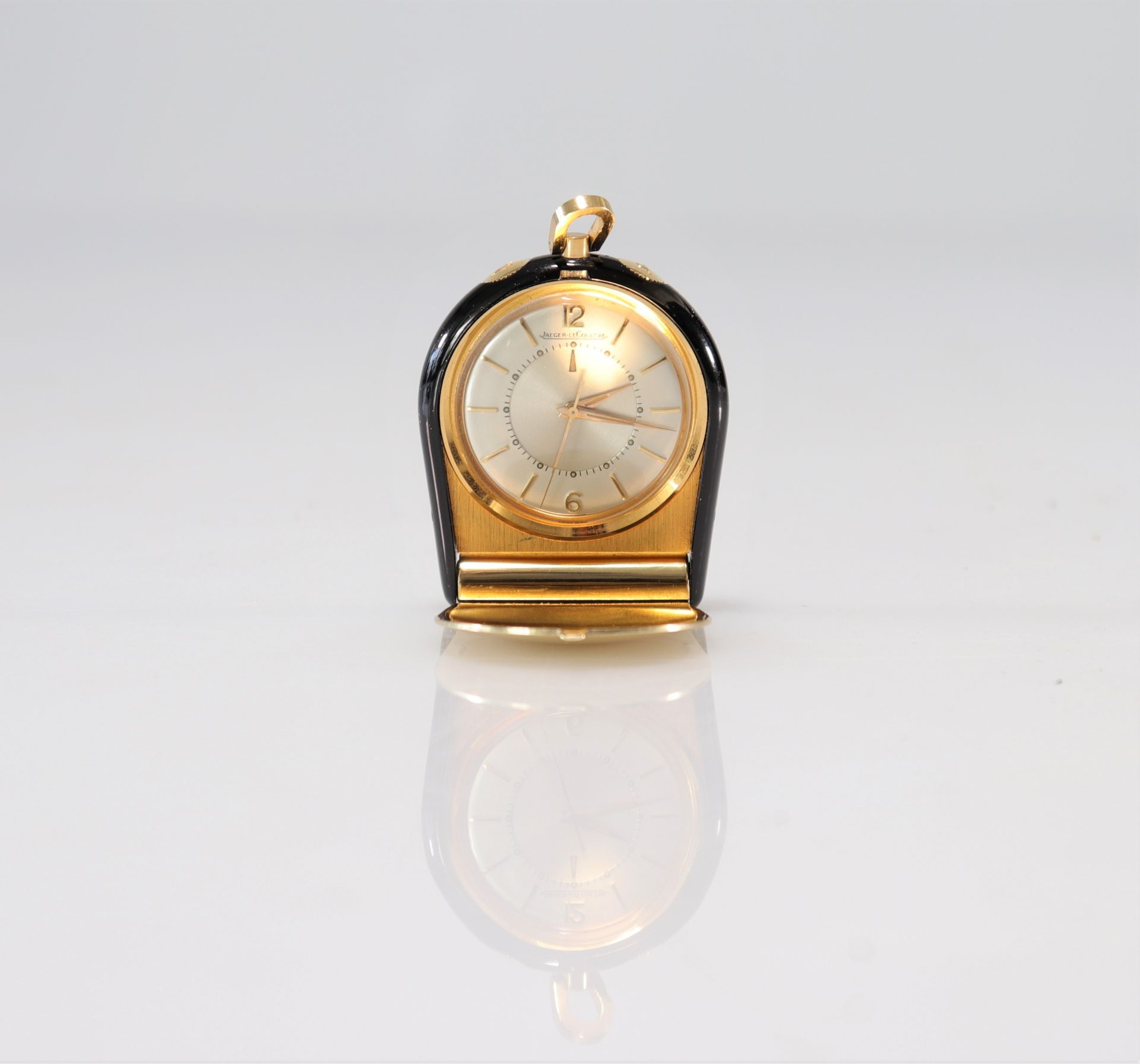 JAEGER-leCOULTRE (Memovox Poche) circa 1960 Travel or pocket alarm clock watch in gilt metal with bl