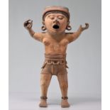 Veracruz Cult Statue depicting a dignitary of the cult of Xipe Totec the "Skinned Lord". Mexico. 200
