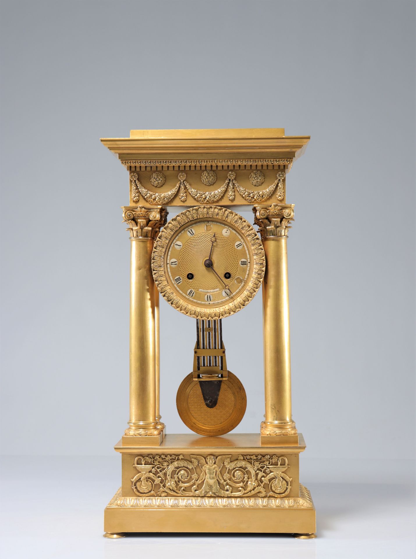 Large Charles X portico clock with pendulum in compensation beautiful quality of gilding