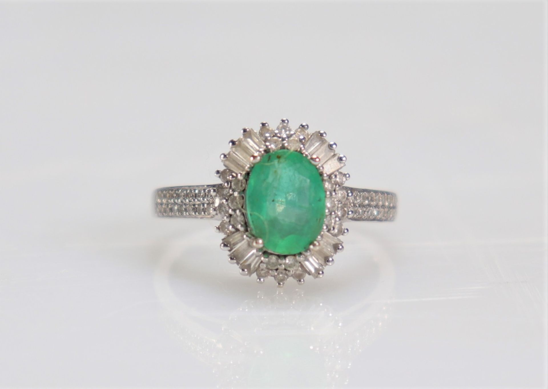 Ring in white gold and emerald (3gr)