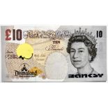 Banksy. â€œQueen Elizabeth IIâ€. Silkscreen on canvas, depicting a 10-pound note.