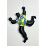 Niki De Saint Phalle. Black chick. Inflatable plastic sculpture. Signed "Nana by Niki" in the plate.
