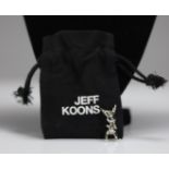 Jeff Koons. Rabbit. Silver metal pendant. Sold with its original pouch marked Jeff Koons.