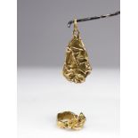 Cesar Baldaccini (Attr). Cuts. Jewelry set comprising a pendant and a brass ring, compressed and wel