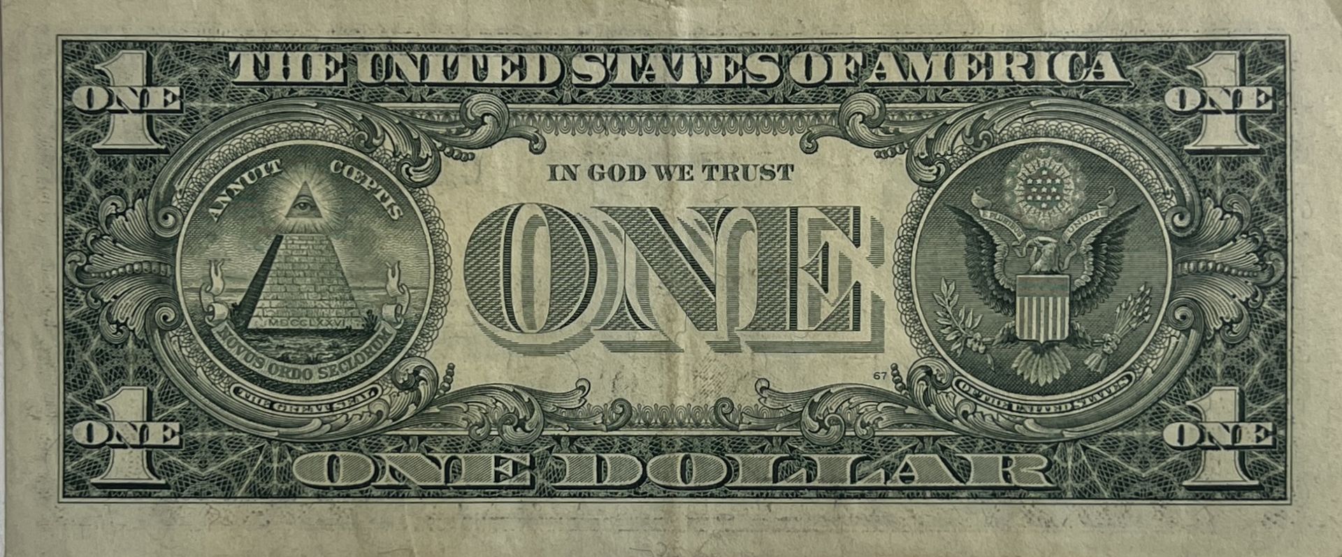 Banksy. â€œBomb Monkeyâ€. 2015. Ink stencil on a real one dollar banknote from â€œThe United States - Image 2 of 4