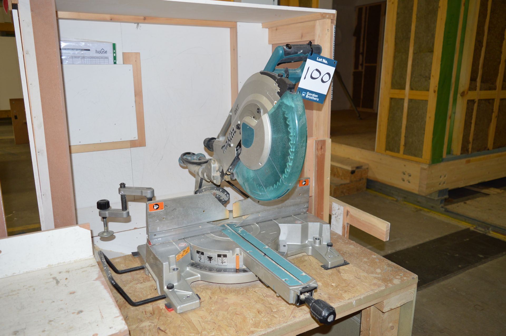 Makita, mitre saw, Model LS1216L, DOM: 2016, Serial No. 19723G, 110v with timber bench