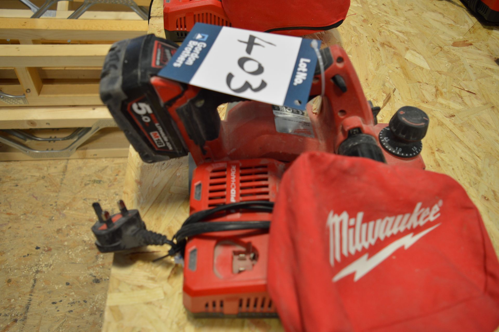 Milwaukee, planer Model M18BP with battery and charger