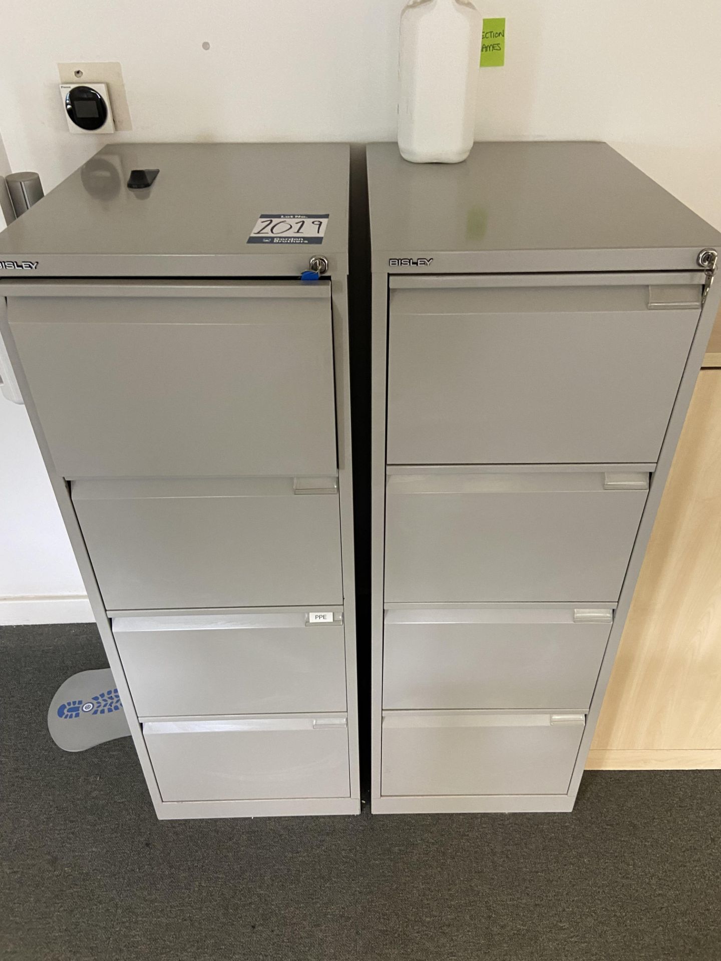 Lot comprisng: four 4 drawer metal bisley filling cabinets