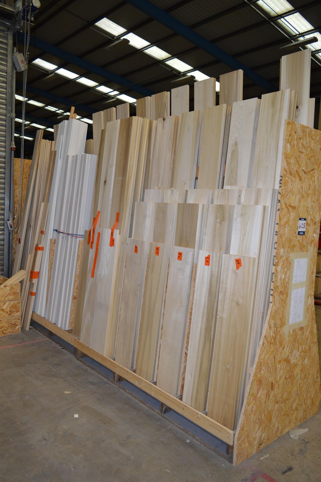 2x (no.) double sided racks and contents of cut timber
