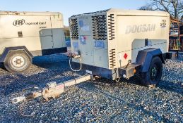 Doosan 7/125 10/110 diesel driven fast tow mobile air compressor Year: 2014 S/N: 660005 Recorded