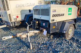 Doosan 7/26E diesel driven fast tow mobile air compressor/generator Year: 2012 S/N: 109160