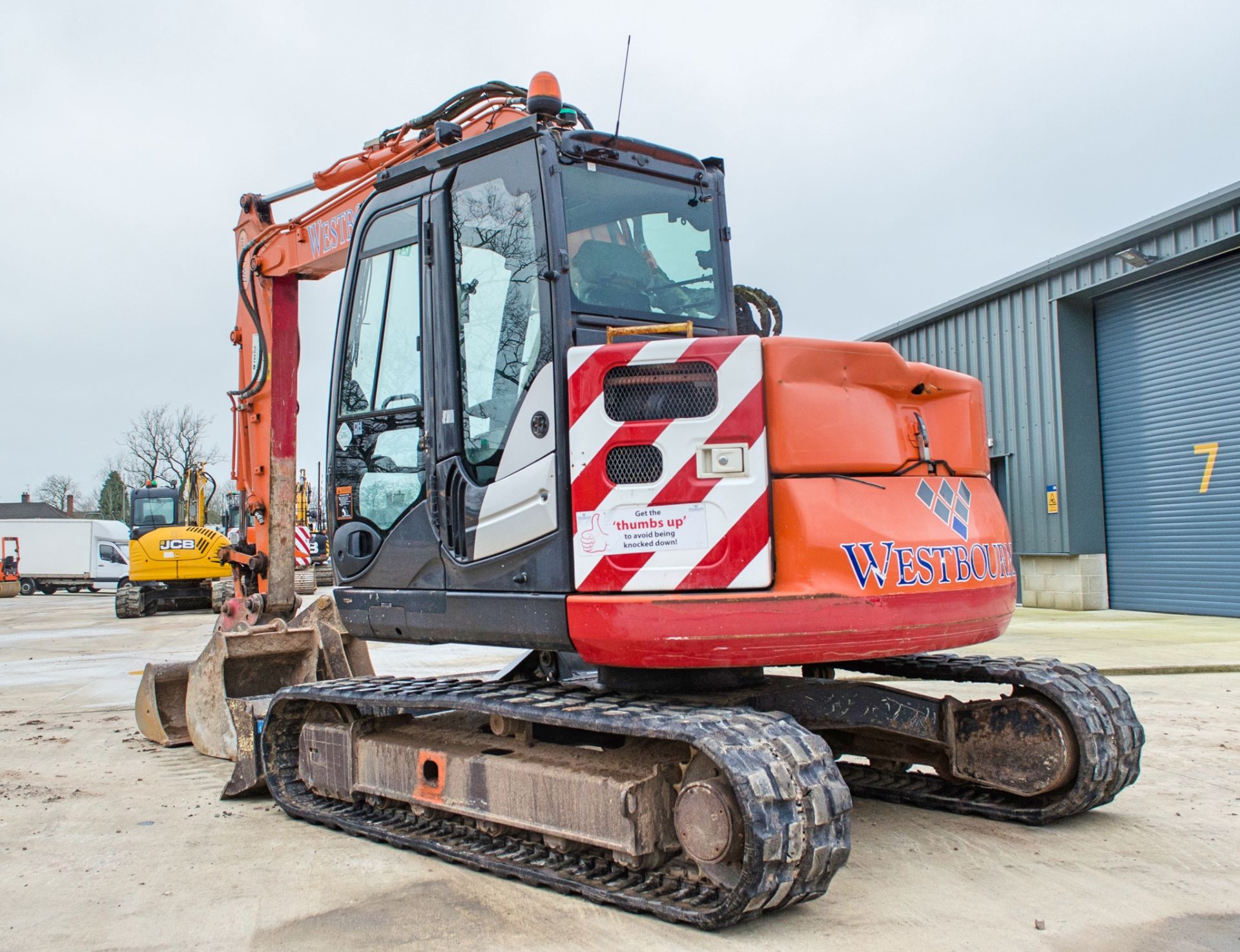 Hitachi ZX 85 US-5A 8.5 tonne rubber tracked midi excavator Year: 2013 S/N: 80038 Recorded hours: - Image 4 of 26