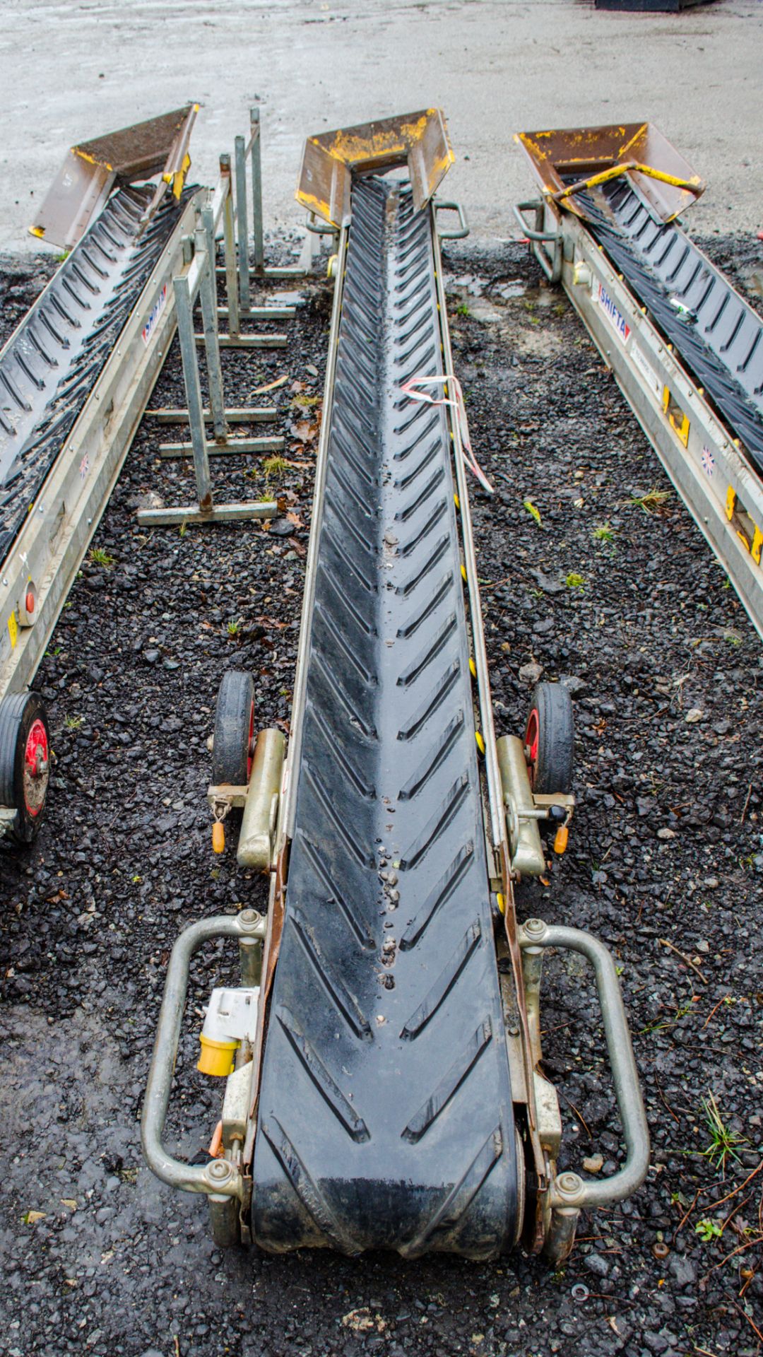Shifta 110v brick conveyor c/w loading hopper ** Conveyor length approximately 14ft ** A682635