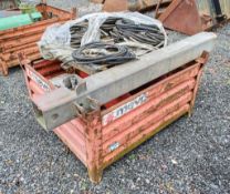 Stillage of trench box components including hydraulic hoses, pins etc. as photographed