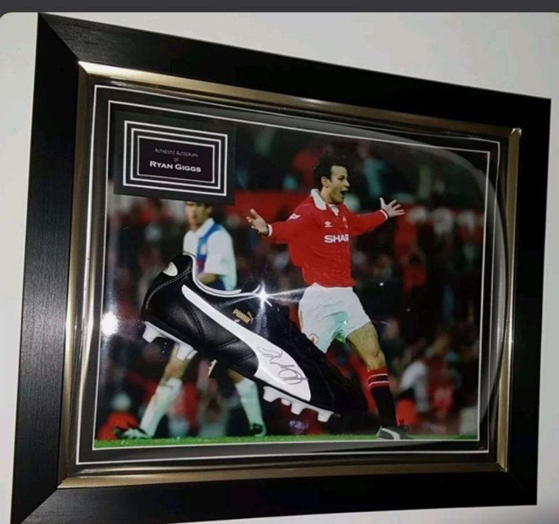 Ryan Giggs signed framed football boot  ** A cost of £15 will be added for postage and packaging **