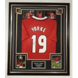 Dwight Yorke signed framed Manchester United football shirt  ** A cost of £15 will be added for