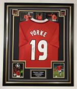Dwight Yorke signed framed Manchester United football shirt  ** A cost of £15 will be added for