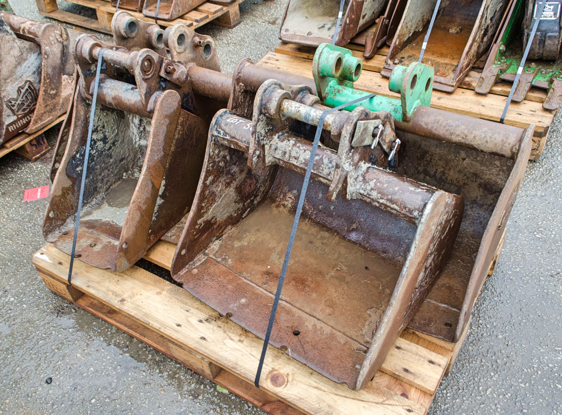 Pallet of 4 mini digger buckets as photographed