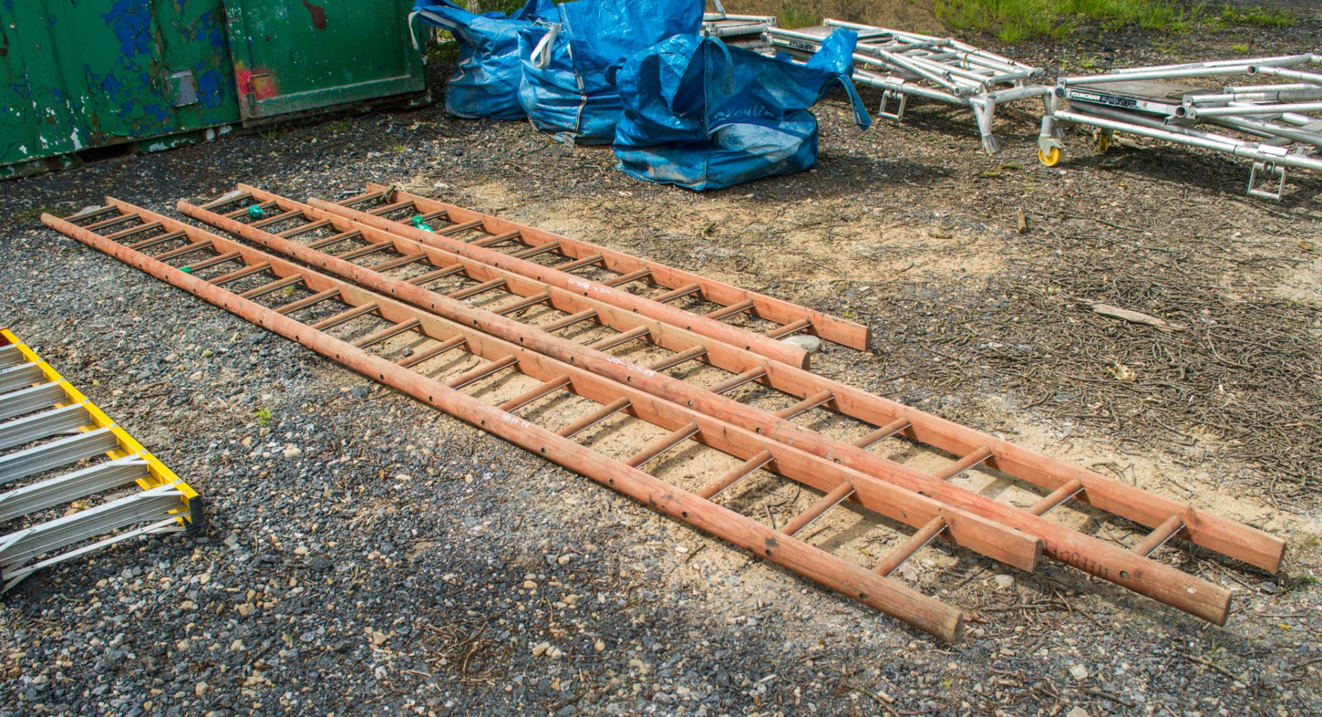 3 wooden ladders