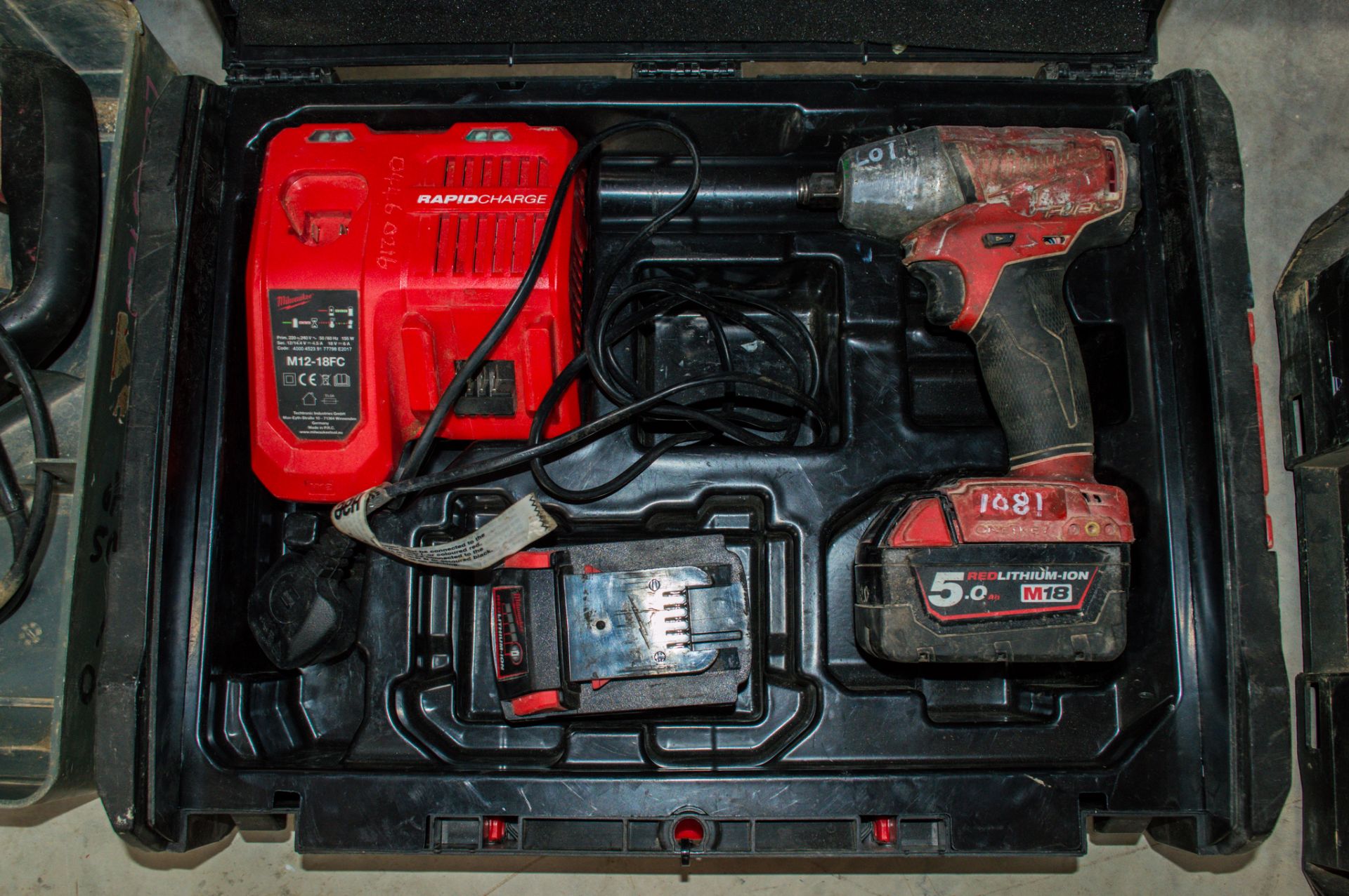 Milwaukee 18v cordless 1/2 inch drive impact gun c/w 2 batteries, charger and carry case 04460276