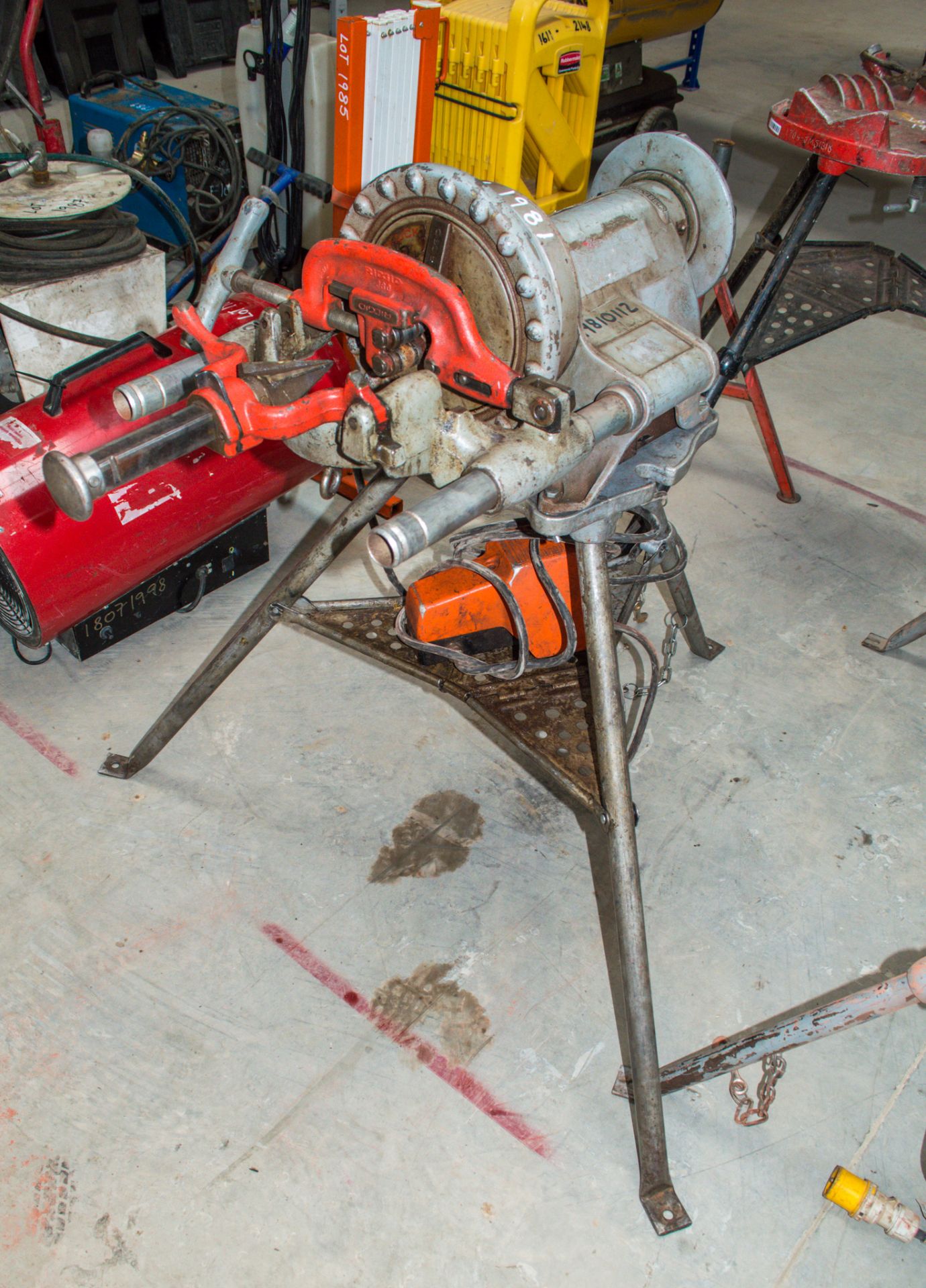 Ridgid 300 110 volt threading machine c/w stand, oil bucket, threading head and foot pedal 1981-