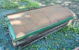 Approximately 15 steel shutters as photographed