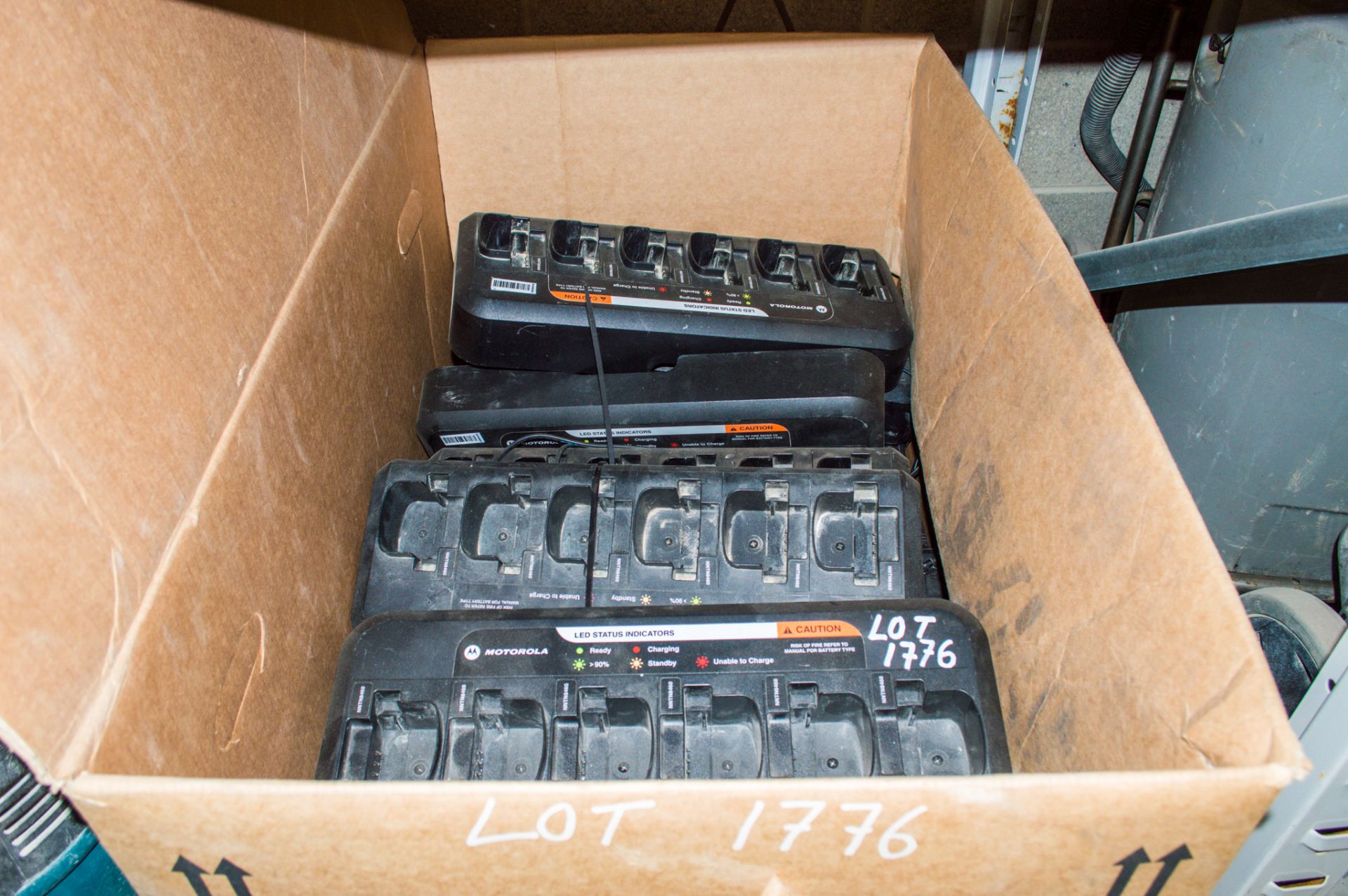 Box of Motorola 2-way radio chargers